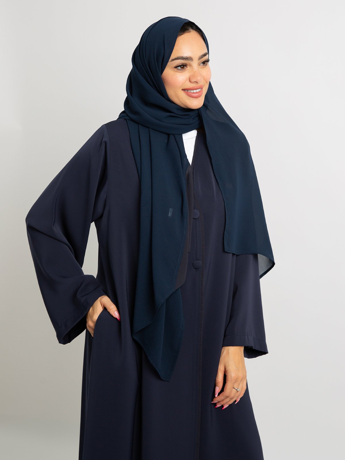 28001fw258sapln-navy-executive-abaya-half-cloche-a-cut-long-closed-abaya-in-crepe-fabric-7-base_1.jpg العباية التنفيذية كحلي - الصورة 1